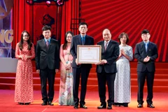 PM Phuc attends ceremony marking 90th anniversary of labour newspaper