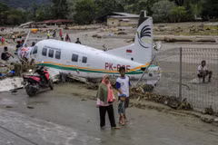Death toll from Indonesia floods rises to 80