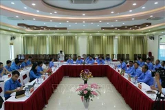 Son La, Lao provinces exchange experience in trade union work