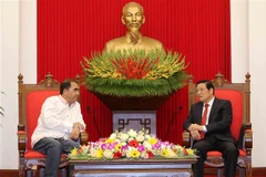 Party official receives Panamanian guest