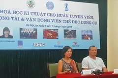 FIG Vice President Nellie Kim teaches Vietnamese gymnasts