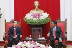 Vietnam, Laos boost cooperation in Party inspection work