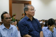 Court upholds sentences on 12 defendants involved in losses at bank