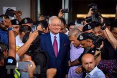 Police summon former Malaysian PM again to record statements