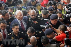 Former Malaysian PM questioned again over 1MDB fund
