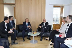 PM holds bilateral meetings in ASEM 12 framework