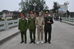 Vietnam returns fugitive to China