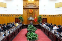 PM encourages Singaporean firms to invest in Vietnam