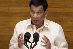 Philippine President signs Muslim autonomy law 