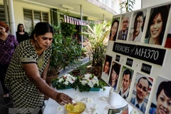 Malaysia to release report on missing flight MH370