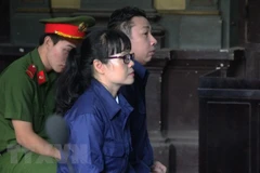 Court reviews swindling case of ex-Vietinbank official