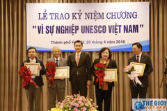 20 individuals presented with UNESCO Vietnam insignia