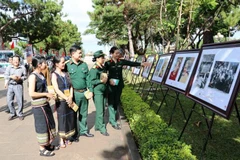 Photo exhibition honours late painter Xu Man 