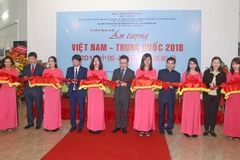 Photo exhibition on Vietnam, China’s beauty opens in Hanoi