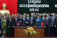 Vietnamese, Lao provinces reinforce multifaceted cooperation