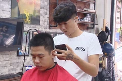 Fans enjoy World Cup with special haircuts