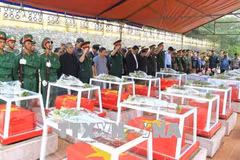 Reburial service held for soldier remains repatriated from Laos, Cambodia