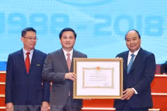 PM requests VietinBank to boost transparency, financial capacity