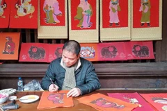 Folk painting genres displayed at Temple of Literature