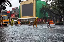 Heavy rain floods multiple streets in Hanoi