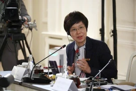 VNA General Director Vu Viet Trang poses a question to Russian President Vladimir Putin during the interview. (Photo: VNA)