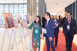VNA photo exhibition at Hanoi Convention signing ceremony