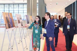 VNA photo exhibition at Hanoi Convention signing ceremony