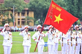 The ceremony features the national flag being hoisted and the national anthem played in a respectful and reverent atmosphere. (Photo: VNA)