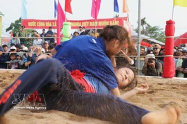 Traditional wrestling festival livens up Sinh village in early spring