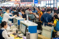 Noi Bai International Airport activates plans to accommodate rising passenger volumes during the 2026 Tet holiday. (Photo: VietnamPlus)