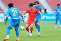Vietnam's U22 show determination against the Philippines in the semi-final on December 15. (Photo: VNA)