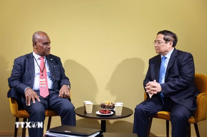 vietnam-solomon-islands-pledge-stronger-ties-on-unoc-3-sidelines-2-vna.jpg