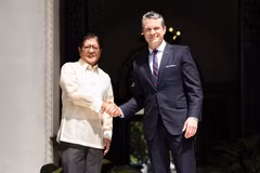 Philippine President Ferdinand Marcos Jr (left) meets with US Defence Secretary Pete Hegseth in Manila on March 28. (Photo: AFP)
