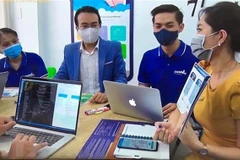 A meeting at a start-up company. Vietnamese startups are banks' new focus. (Photo: VNA)