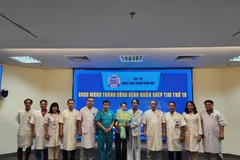 The Hue Central Hospital discharges and congratulates the patient on his successful heart transplant on August 4. (Photo: VNA)