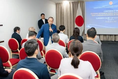 A representative of a Japanese enterprise speaks at the event. (Photo: VNA)