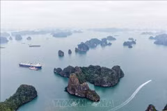Ha Long Bay has been listed as a UNESCO World Natural Heritage Site on three occasions. (Photo: VNA)