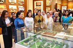 Participants tour the NA’s Tradition Hall (Photo: VNA)