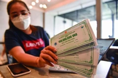 A positive sign is the recent trend of companies buying back bonds ahead of maturity. — (Photo: thanglong.chinhphu.vn)