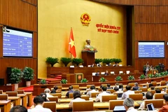 With 441 out of 445 lawmakers voting in favour, the Law on Digital Technology Industry is adopted (Photo: VNA)