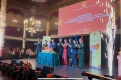 Vietnamese Ambassador to France Dinh Toan Thang and delegates at the ceremony. (Photo: VNA)