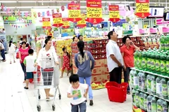 Customers at a supermarket in HCM City. The city faces rising inflation challenges. (Photo: VNA)