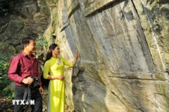 The Han-Nom inscriptions, carved directly into the cliffs of the Special National Historic and Scenic Site of Non Nuoc Mountain (Photo: VNA)