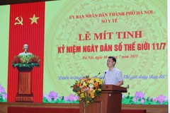 Le Thanh Dung, Director of the Population Authority under the Ministry of Health, speaks at the meeting. (Photo: VNA)