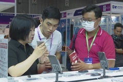 Visitors at the expo (Photo: VNA)