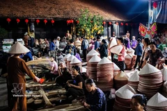Market keeps centuries-old conical hat craft alive