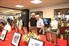 Visitors at the exhibition (Photo: VNA)