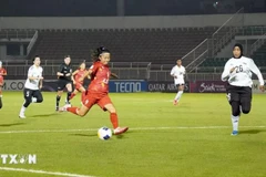 Ho Chi Minh City Women’s FC (in red) defeats Abu Dhabi (in white). (Photo: VNA)