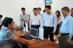 A working group inspects the pilot rollout and preparations for the two-tier local government model in Lai Chau province (Photo: VNA)
