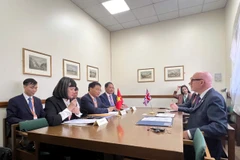 Finance Minister Nguyen Van Thang holds a meeting with the UK Prime Minister’s Trade Envoy Matt Western. (Photo: VNA)